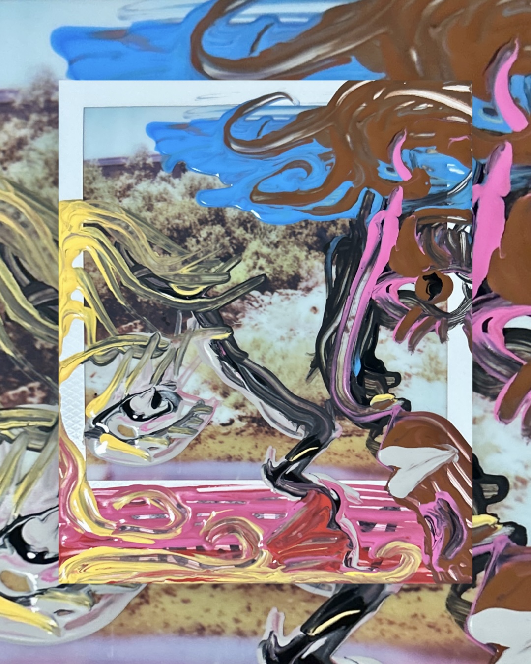 a brown and blue figure lunging over a Polaroid of a beach