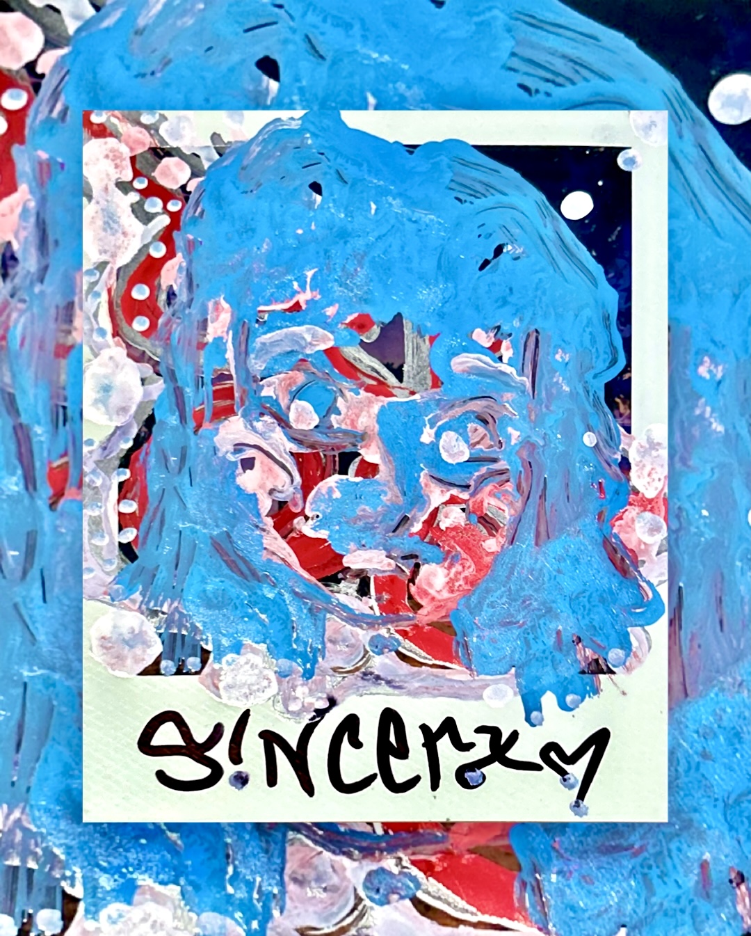 an expressive face in swirling light blue, red, and speckled white painted over a Polaroid